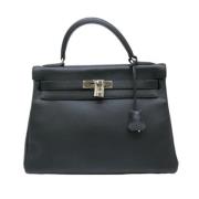 Pre-owned Fabric handbags Hermès Vintage , Black , Dames