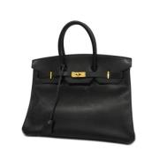 Pre-owned Fabric handbags Hermès Vintage , Black , Dames