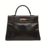 Pre-owned Fabric handbags Hermès Vintage , Black , Dames