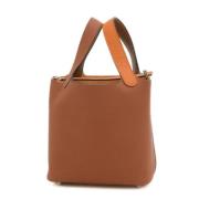 Pre-owned Fabric handbags Hermès Vintage , Brown , Dames