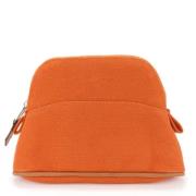 Pre-owned Fabric pouches Hermès Vintage , Orange , Dames