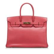 Pre-owned Leather handbags Hermès Vintage , Red , Dames