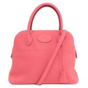 Pre-owned Leather handbags Hermès Vintage , Pink , Dames