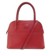 Pre-owned Leather handbags Hermès Vintage , Red , Dames