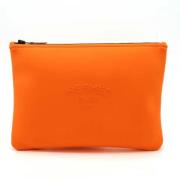 Pre-owned Fabric clutches Hermès Vintage , Orange , Dames