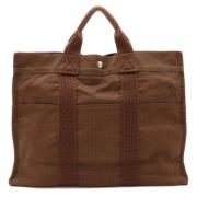 Pre-owned Canvas handbags Hermès Vintage , Brown , Dames