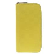 Pre-owned Leather wallets Louis Vuitton Vintage , Yellow , Dames