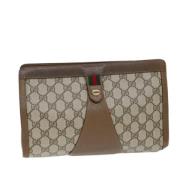 Pre-owned Canvas clutches Gucci Vintage , Beige , Dames