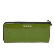 Pre-owned Leather wallets Miu Miu Pre-owned , Green , Dames