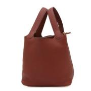 Pre-owned Leather handbags Hermès Vintage , Brown , Dames