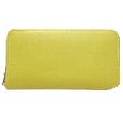 Pre-owned Canvas wallets Hermès Vintage , Yellow , Dames