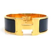 Pre-owned Metal bracelets Hermès Vintage , Yellow , Dames