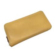 Pre-owned Leather wallets Hermès Vintage , Yellow , Dames