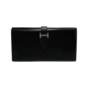 Pre-owned Leather wallets Hermès Vintage , Black , Dames