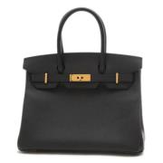 Pre-owned Leather handbags Hermès Vintage , Black , Dames