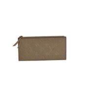 Pre-owned Leather clutches Louis Vuitton Vintage , Brown , Dames