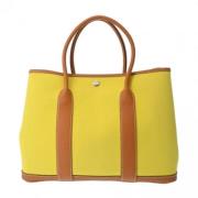 Pre-owned Leather handbags Hermès Vintage , Yellow , Dames