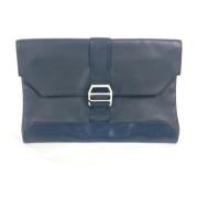 Pre-owned Leather clutches Hermès Vintage , Blue , Dames