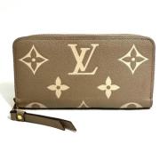 Pre-owned Fabric wallets Louis Vuitton Vintage , Beige , Dames