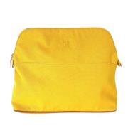 Pre-owned Fabric pouches Hermès Vintage , Yellow , Dames