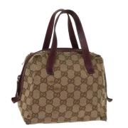 Pre-owned Canvas pouches Gucci Vintage , Beige , Dames