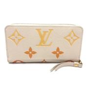 Pre-owned Fabric wallets Louis Vuitton Vintage , Beige , Dames