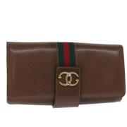 Pre-owned Leather clutches Gucci Vintage , Brown , Dames