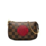 Pre-owned Canvas clutches Louis Vuitton Vintage , Brown , Dames