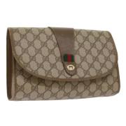 Pre-owned Leather clutches Gucci Vintage , Beige , Dames