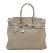 Pre-owned Leather handbags Hermès Vintage , Beige , Dames