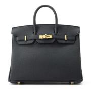 Pre-owned Leather handbags Hermès Vintage , Black , Dames