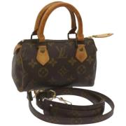 Pre-owned Canvas handbags Louis Vuitton Vintage , Brown , Dames