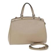 Pre-owned Leather handbags Louis Vuitton Vintage , Beige , Dames