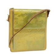 Pre-owned Leather pouches Louis Vuitton Vintage , Yellow , Dames