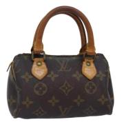 Pre-owned Canvas handbags Louis Vuitton Vintage , Brown , Dames