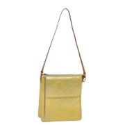 Pre-owned Leather pouches Louis Vuitton Vintage , Yellow , Dames