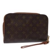 Pre-owned Canvas clutches Louis Vuitton Vintage , Brown , Dames