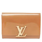 Pre-owned Leather clutches Louis Vuitton Vintage , Beige , Dames