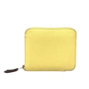 Pre-owned Leather wallets Hermès Vintage , Yellow , Dames