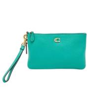 Pre-owned Leather clutches Coach Pre-owned , Green , Dames