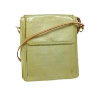 Pre-owned Leather pouches Louis Vuitton Vintage , Green , Dames