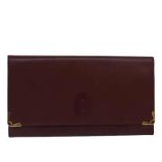 Pre-owned Leather clutches Cartier Vintage , Red , Dames