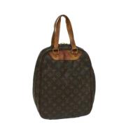 Pre-owned Canvas handbags Louis Vuitton Vintage , Brown , Dames