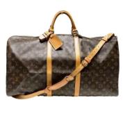 Pre-owned Fabric handbags Louis Vuitton Vintage , Brown , Dames