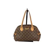 Pre-owned Canvas handbags Louis Vuitton Vintage , Brown , Dames