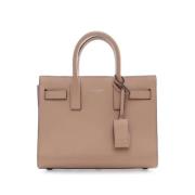 Pre-owned Leather handbags Yves Saint Laurent Vintage , Beige , Dames