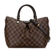 Pre-owned Plastic handbags Louis Vuitton Vintage , Brown , Dames