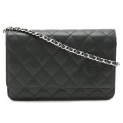 Pre-owned Leather clutches Chanel Vintage , Black , Dames