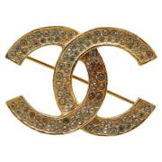 Pre-owned Metal brooches Chanel Vintage , Yellow , Dames