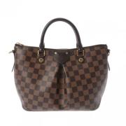 Pre-owned Fabric handbags Louis Vuitton Vintage , Brown , Dames